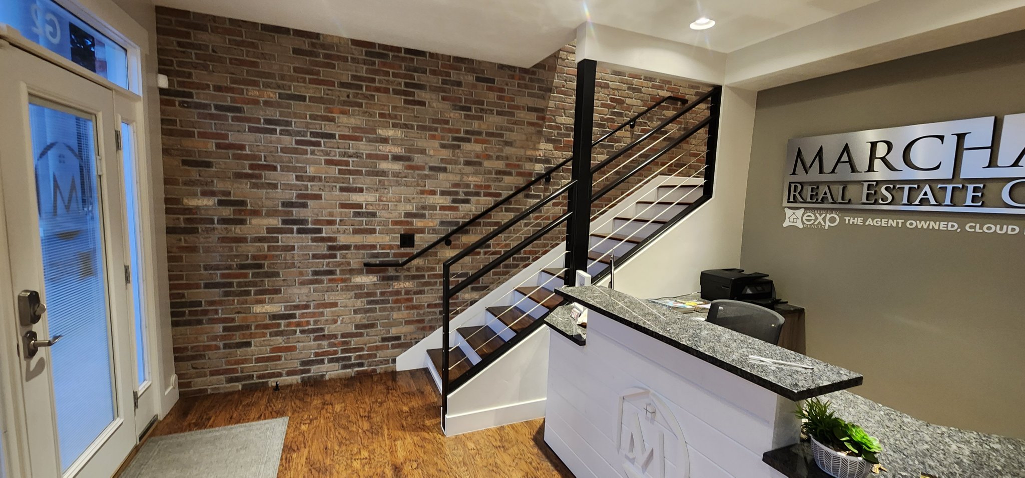 Interior office with a brick feature wall