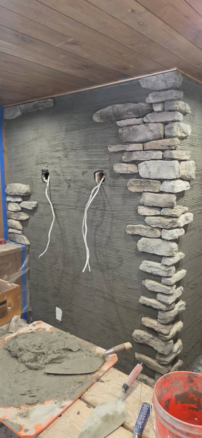 During: stone accent wall taking shape