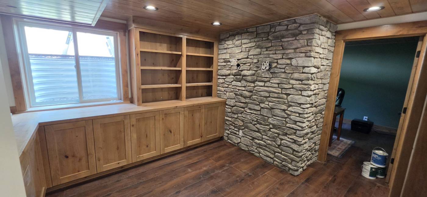 After: stone accent wall with built-in shelving
