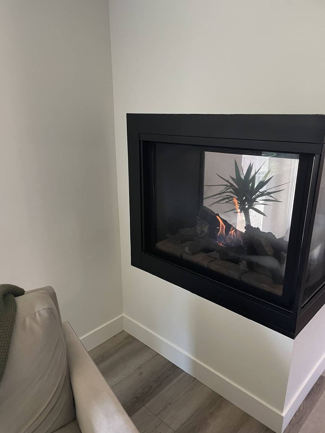 After: modern double-sided gas fireplace