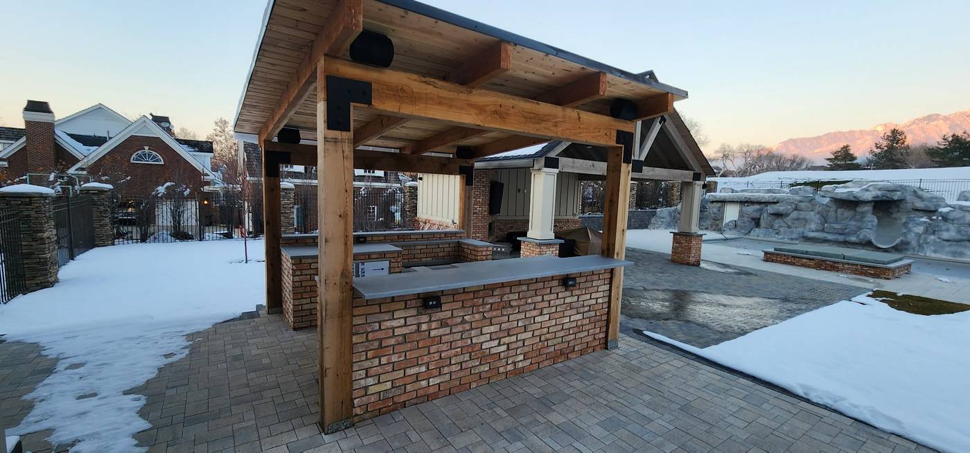 After: brick outdoor kitchen under the pavilion