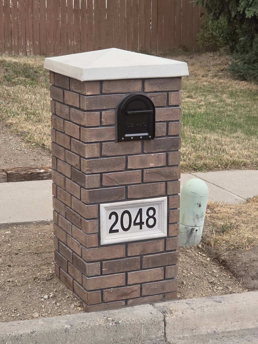 Brick mailbox pillar