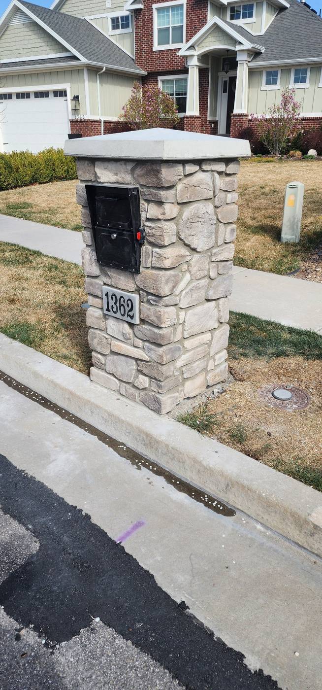 Stone mailbox pillar