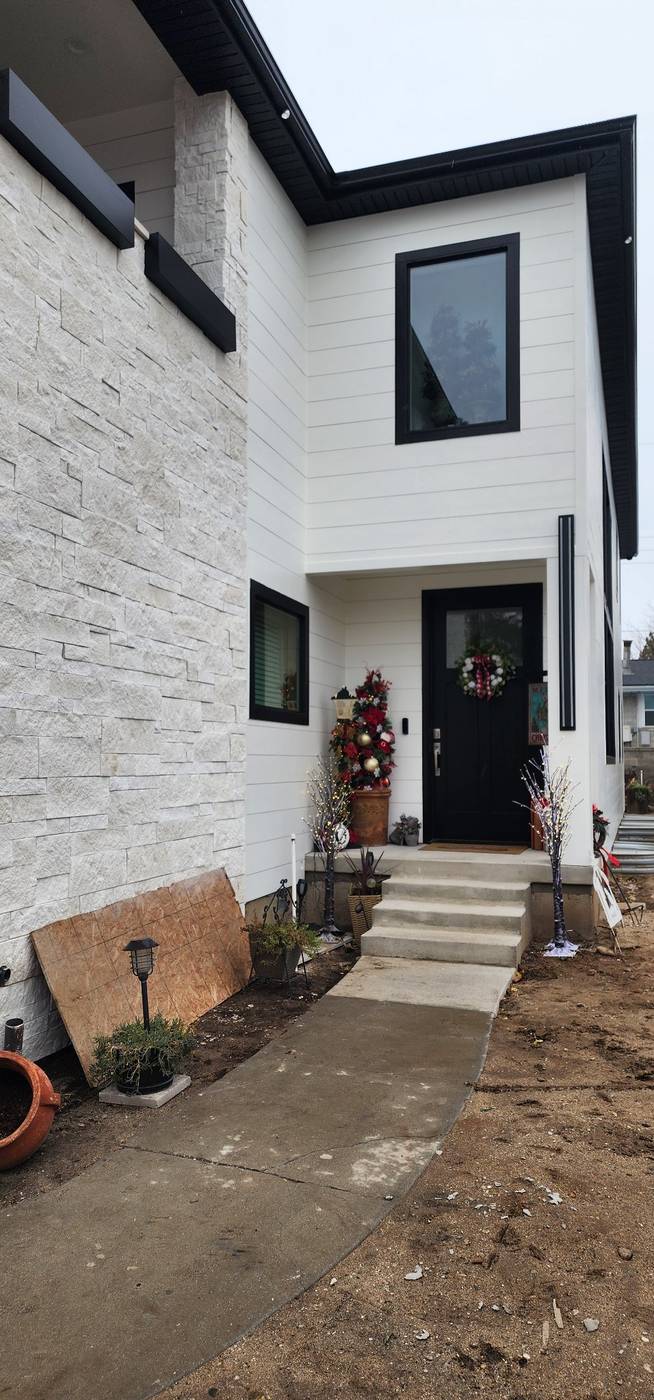White stacked-stone veneer, entry detail