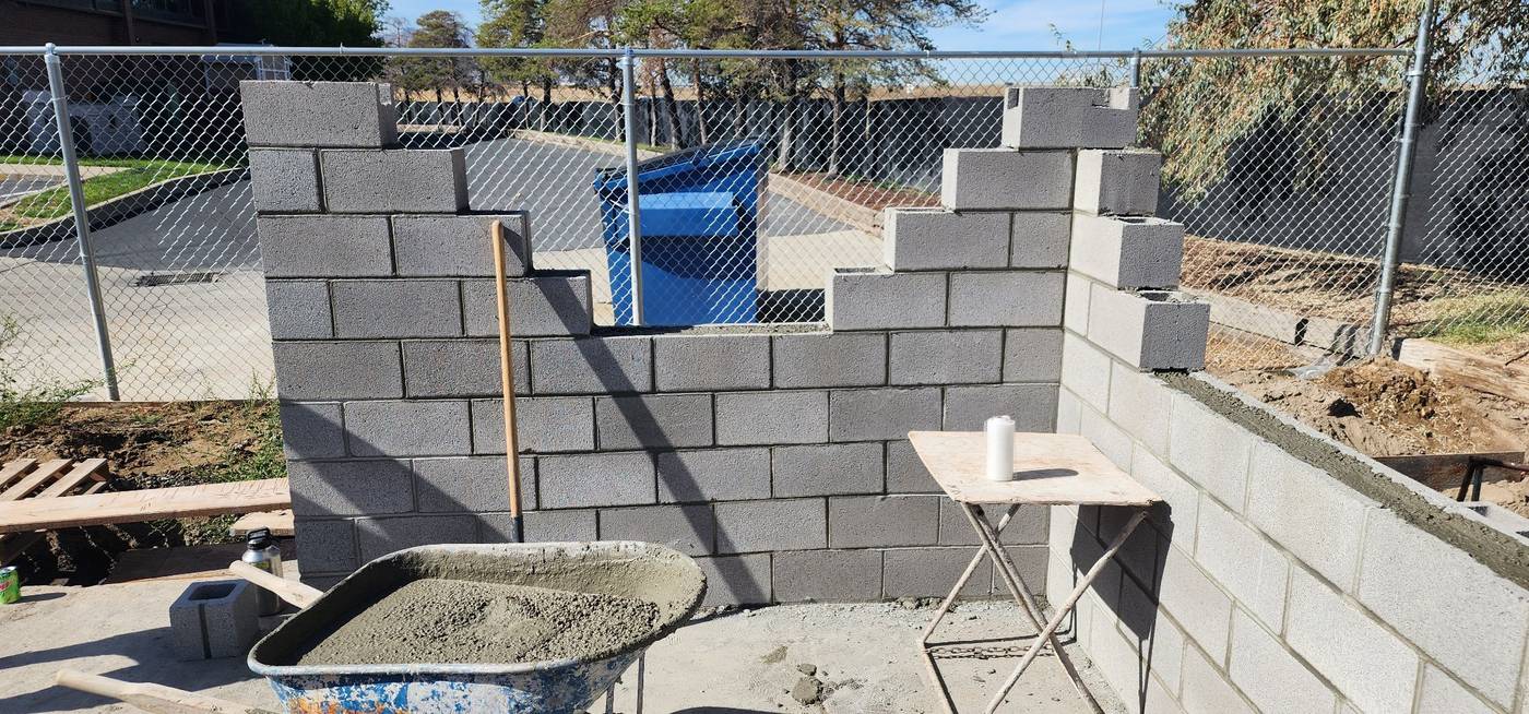 Block wall courses going up