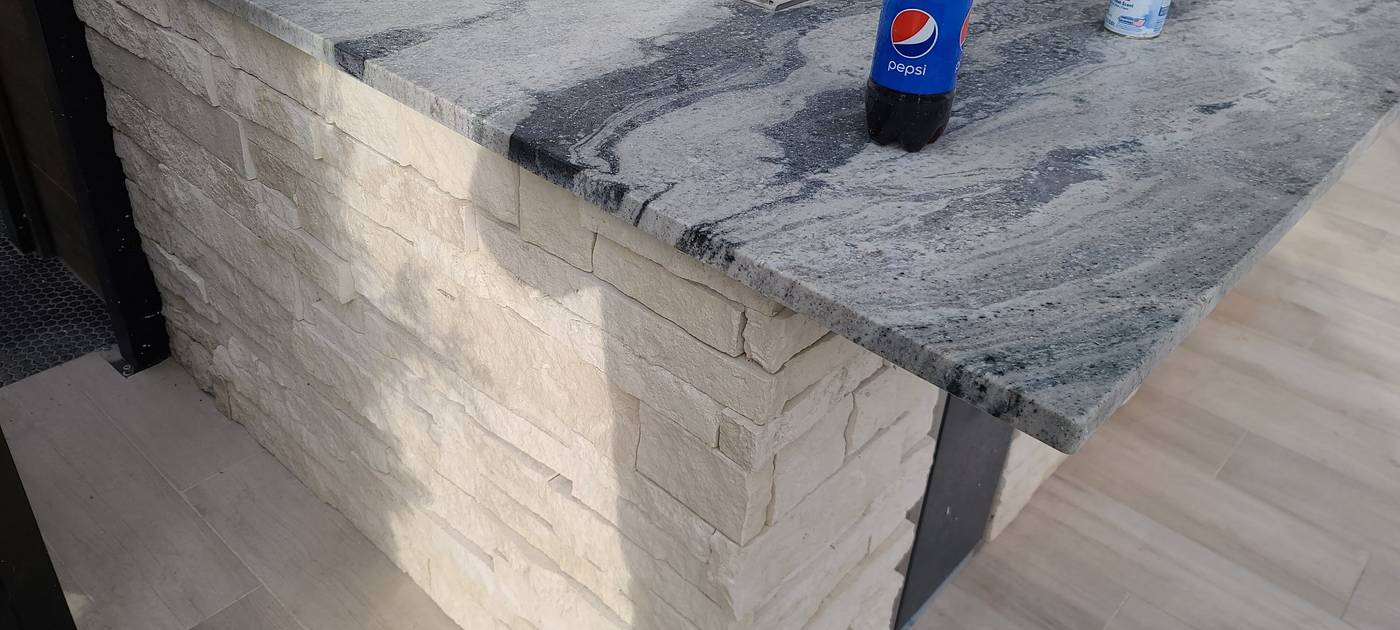 Outdoor bar island with granite top