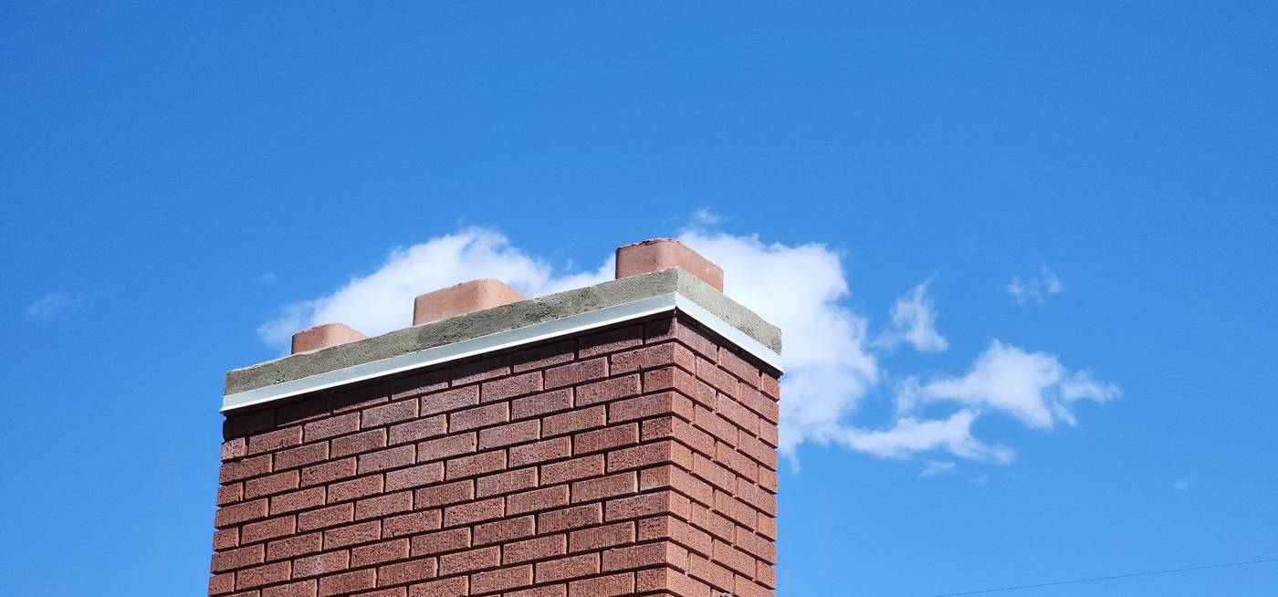 Brick chimney, three flues